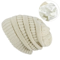 Winter knit beanie with satin lining and thick texture for hair protection in off-white - Beige