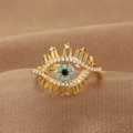 Golden Evil Eye open ring with blue stones and white zircon crystals on brown silk - Evil Eye Eyelash Trim (Q-J077) / Gold