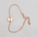 Rose gold hollow round bracelet featuring cutout letter T with adjustable lobster clasp - Rose Gold T
