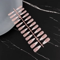 Detailed overhead view of French manicure press-on nails with pink base and white tips - French White Tip Long Almond Glossy (XFS-MP08)