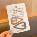 Three-piece set of matte earth-toned hollow heart hair clips on display card - Oval Heart Set - 3 Pcs (4.5cm)