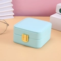 Light blue PU leather jewelry box with gold metal lock and square design - Light Blue