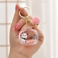 Pink liquid quicksand panda keychain with bell and glitter inside a TV-shaped charm - Bell Pendant Style / Pink