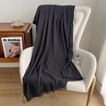 Dark gray linen meditation shawl with fringed edges displayed on a white chair - Gray