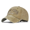 Close-up of white 3D New York embroidery on washed cotton khaki baseball cap detail - NEW YORK Khaki