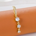 Golden belly button ring with three vertical round white zircons on leather - Triple Drill Style (Gold White)