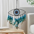 Black and blue Evil Eye dreamcatcher wall hanging with feathers and wooden beads - Black Brown Evil Eye
