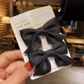 Set of two black fabric bow hair clips for girls on minimalist white display card - Handmade Bow (A1721) / 2 Pcs/Set / Black