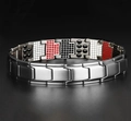 Macro detail of silver magnetic therapy bracelet with inset health elements on black background - Silver Bracelet