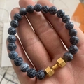 Men's fitness bracelet with black white patterned beads and golden dumbbell charm - Weathered Gold