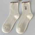 Mid-calf cream cotton socks with vertical stripes, wavy brown trim and rabbit embroidery - One Size / Cream