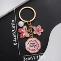 Golden Mother's Day keychain with pink enamel butterfly, flower and white pearl - Pink (ER699)