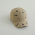 Close-up of bear embroidery and handwritten text on khaki cotton twill baseball cap - 50-52cm (2-5 Years) / Khaki