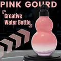 Pink gradient gourd shaped plastic water bottle with black screw cap on display stand - 950ML / Pink (With Strap + Carry Rope)