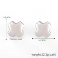 Detailed view of silver X-shaped titanium steel earrings with 2.8cm size specifications - X-Shape Steel Earrings (F1367)