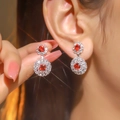 Sparkling double-layered snowflake drop earrings with red and white crystals in silver finish - Silver Red