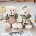 Pair of white teddy bears in green plaid outfits including a dress and overalls - 30cm Pair / Green Plaid Apron