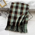 Brown, teal and burnt orange plaid scarf with fringe tassels in a lifestyle setup - Green & Coffee