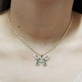 Elegant gold-tone necklace featuring a black and white patterned butterfly pendant - Single Layer Gold Butterfly
