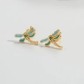 Minimalist gold dragonfly stud earrings with blue enamel wings and green gemstone - Blue Dragonfly