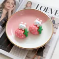 Detail view of 20x24mm resin strawberry bunny charms for DIY jewelry and hair accessories - Bunny on Strawberry
