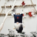 Dark blue gnome Christmas ornament with red star embroidery and long white beard on tree - Navy Blue