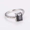 Macro view of silver ring featuring a rectangular black gem and side pave diamonds - US 7 / Silver/Black Zirconia