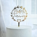 Detailed view of a golden acrylic Mr & Mrs Forever cake topper with a heart wreath design - Gold Wreath Heart Frame Type B MR&MRS
