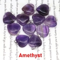 Close-up of heart-shaped amethyst pendants with unique natural purple stone textures - Necklace (With Black Rope) / Amethyst
