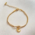 Golden double-layer snake chain bracelet featuring a letter C pendant and extender - Gold-C