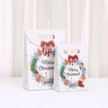 Christmas paper gift bags with red bows and Merry Christmas print in multiple sizes - 20x14x7cm / White (Polar Bear)