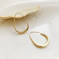 Detailed view of elegant gold-toned irregular teardrop hoop earrings on a marble tray - Irregular Teardrop Open Hoop (24# Ear Hook-Gold)