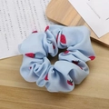Light blue organza scrunchie with red strawberry print and elegant pleated texture - Blue Strawberry