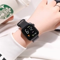 Close-up of square LED digital watch showing heart rate and step counter icons - Black