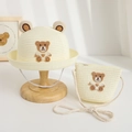 Close-up of kids straw sun hat and matching crossbody bag with cute bear ears and embroidery - 48-52cm / Straw Hat And Bag Set / Cream