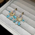 Detailed macro view of fan-shaped fringe earrings with vibrant colorful gemstones - Bohemian Iridescent Waterdrop Style (HE29086)