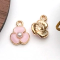 Pink enamel flower charm with white pearl center for DIY jewelry making and bracelets - Beaded Three-Petal Flower (11893)