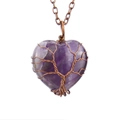 Detailed view of heart-shaped amethyst pendant with copper wire life tree weave - Antique Copper + Amethyst