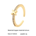 Adjustable 14K gold plated X-shaped letter ring with cubic zirconia inlay on copper base - Letter X