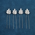 Macro detail of silver leaf crystal bridal hair pins set on navy textured fabric - Marquise Rhinestone Leaf Style (FZ-001) / 4Pcs Set / Silver