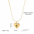 Detail of 18k gold heart pendant with blue stone and product dimension measurements - Hammered Heart Blue Gem Style (TN3100)