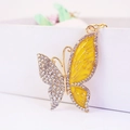 Close-up of golden butterfly keychain with white rhinestones and yellow enamel detail - Individual Packaging / Yellow