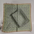Light green silk-like square scarf featuring classic paisley patterns and a bronze border - Cashew Green Small Square Scarf / 65