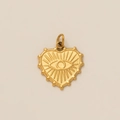Macro detail of 18K gold-plated heart pendant featuring an evil eye design and beads - Evil Eye Heart