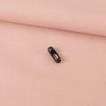 Macro detail of a 2.4mm black stainless steel bead chain connector on pink fabric - Black Waist Buckle