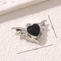 Macro detail of gothic bat wing heart pendant in silver and black with size dimensions - Bat Wings Heart Style