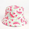 Detail of white cotton bucket hat featuring a vibrant pink watermelon print pattern - Watermelon White