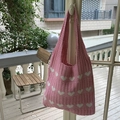Pink knitted shoulder bag with white heart patterns and soft crochet texture - Pink