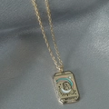 Vintage gold tarot card necklace featuring The Empress pendant with colorful enamel details - Gold Empress