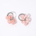 Detail of pink hollow floral earrings featuring silver hoops and resin flower petals - Steel-Pink
